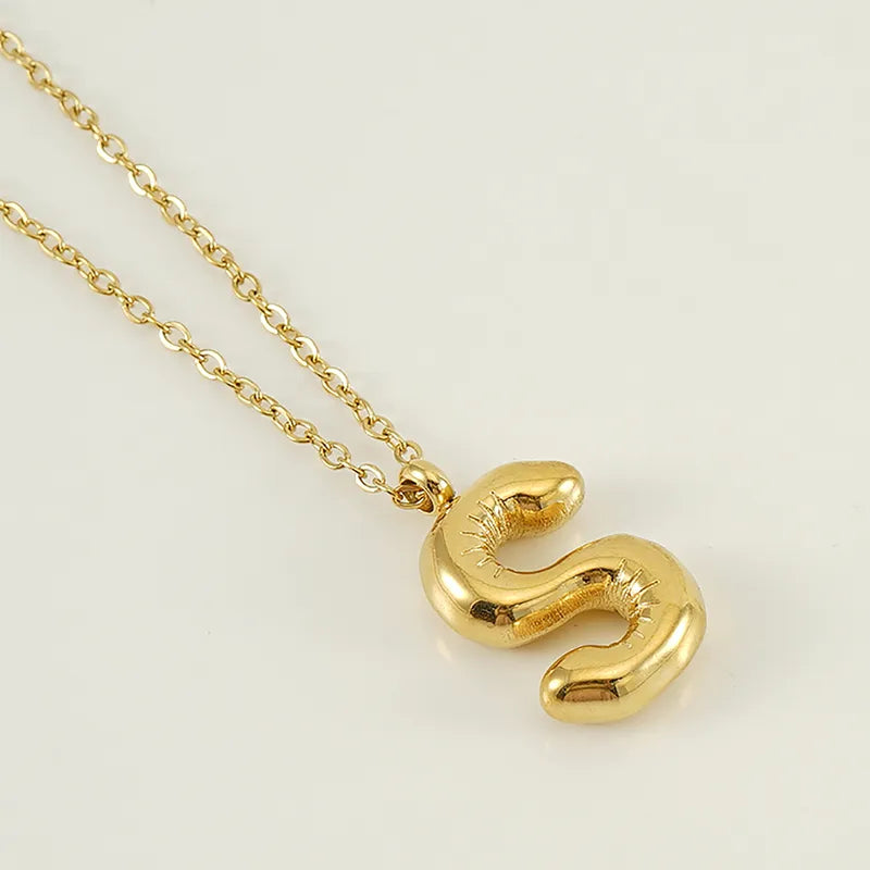 Acero-inoxidable-304-chapados-en-oro-de-18k-Casual-Lindo-Enchapado-Letra-Acero-Titanio-Collar-Colgante_a69b9f47-b2b7-47cc-b59d-7cfa873dbf43.webp